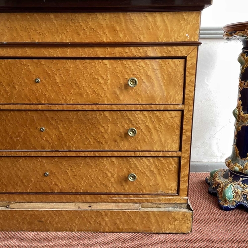 1922 - A Biedermeier maple chest, with a gray marble top above four long drawers and raised on a plinth bas... 