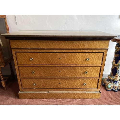 1922 - A Biedermeier maple chest, with a gray marble top above four long drawers and raised on a plinth bas... 