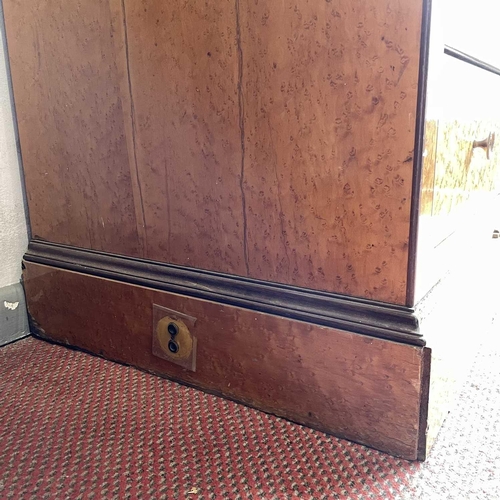 1922 - A Biedermeier maple chest, with a gray marble top above four long drawers and raised on a plinth bas... 