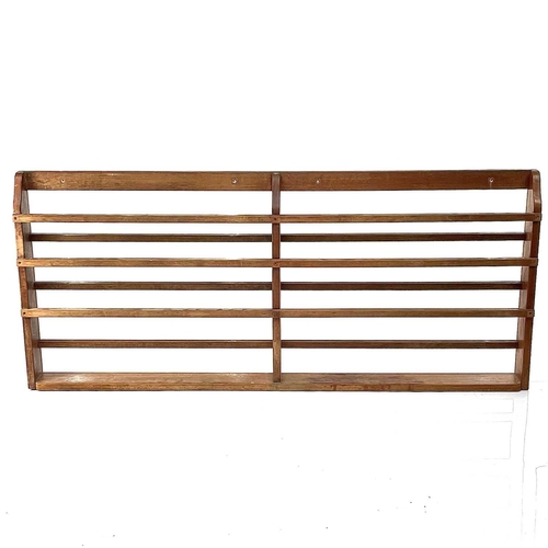 1934 - A teak open plate rack, 20th century, height 92cm, width 211cm, depth 13cm.