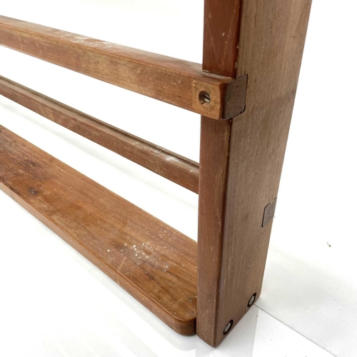 1934 - A teak open plate rack, 20th century, height 92cm, width 211cm, depth 13cm.