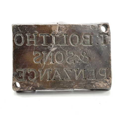 195 - A bronze hot mark inscribed 'T. BOLITHO & SONS PENZANCE', 8 x 12cm.