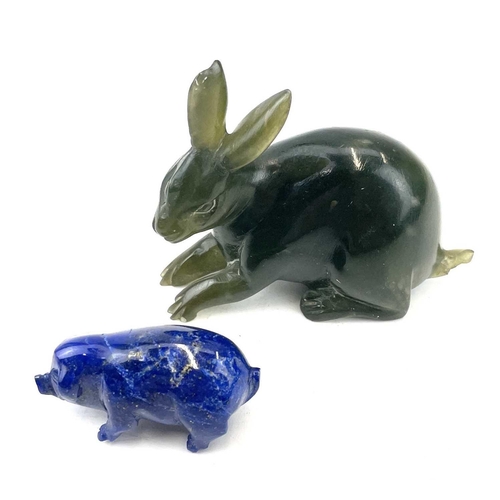 197 - A Green hard stone carved figure of a hare, length 7.5cm, together with a lapis lazuli pig (2).