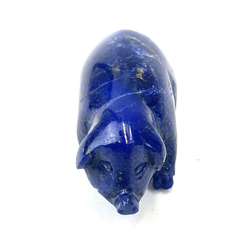 197 - A Green hard stone carved figure of a hare, length 7.5cm, together with a lapis lazuli pig (2).