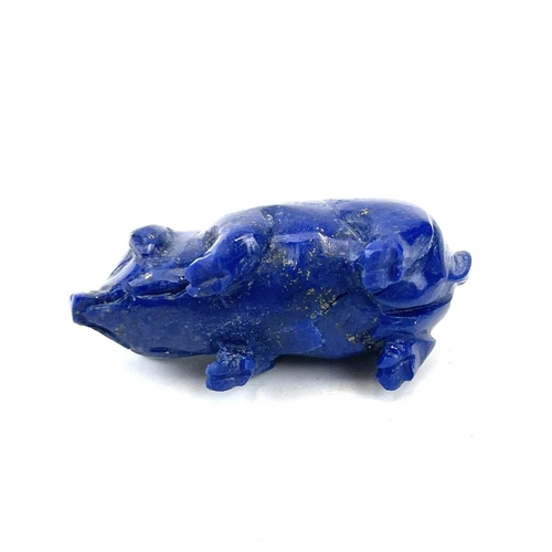 197 - A Green hard stone carved figure of a hare, length 7.5cm, together with a lapis lazuli pig (2).