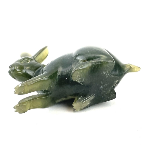 197 - A Green hard stone carved figure of a hare, length 7.5cm, together with a lapis lazuli pig (2).