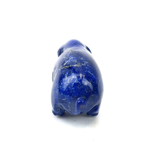 197 - A Green hard stone carved figure of a hare, length 7.5cm, together with a lapis lazuli pig (2).