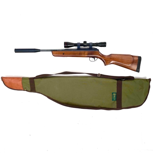 209 - A BSA .22 air rifle with silencer and Simmons scope, numbered DS 9265, length 95cm in a canvas case.... 