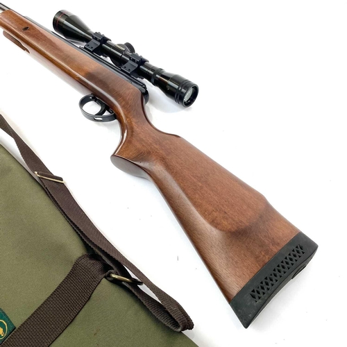 209 - A BSA .22 air rifle with silencer and Simmons scope, numbered DS 9265, length 95cm in a canvas case.... 