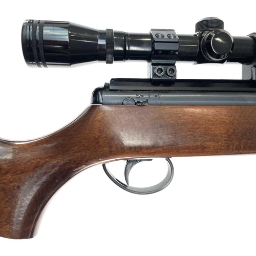 209 - A BSA .22 air rifle with silencer and Simmons scope, numbered DS 9265, length 95cm in a canvas case.... 