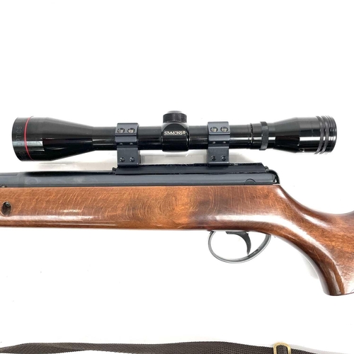 209 - A BSA .22 air rifle with silencer and Simmons scope, numbered DS 9265, length 95cm in a canvas case.... 