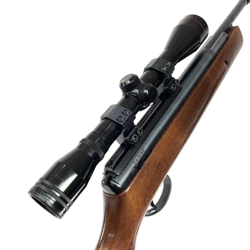 209 - A BSA .22 air rifle with silencer and Simmons scope, numbered DS 9265, length 95cm in a canvas case.... 