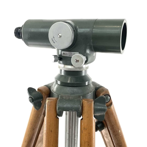 211 - A Hilger & Watts Autoset level, with green enamel finish, cased, together with folding tripod and st... 