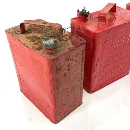 217 - Two vintage Shell petrol cans, an Esso example, and one other (4).