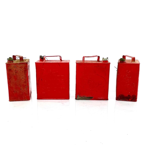 217 - Two vintage Shell petrol cans, an Esso example, and one other (4).