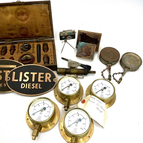 218 - Three oval cast bronze plaques for Lister diesel, 11.5X17cm, together with four brass oil pressure g... 