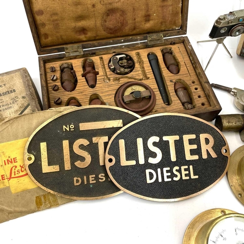 218 - Three oval cast bronze plaques for Lister diesel, 11.5X17cm, together with four brass oil pressure g... 