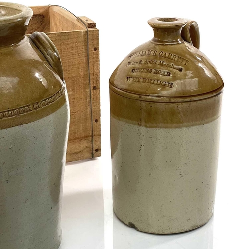 219 - A Stoneware flagon stamped 'William S Garrett Weybridge', height 32cm, together with other stoneware... 