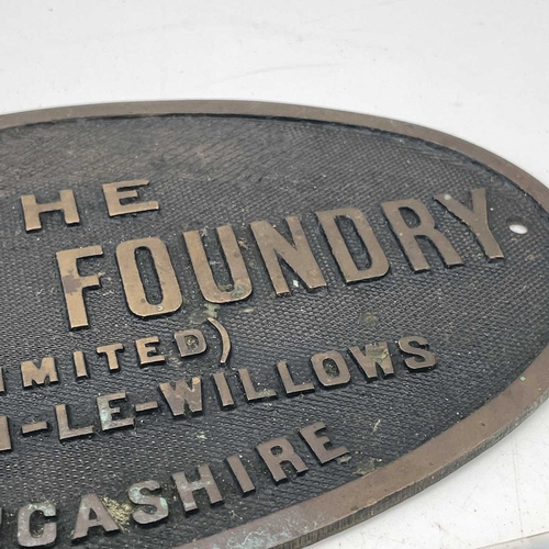 223 - The Vulcan Foundry oval locomotive brass plaque width 24.5cm together with a pair of ceramic tiles w... 