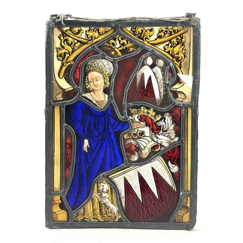 227 - A stained glass panel, 17th/18th century, depicting a lady in a blue dress with a dog at her feet, 3... 