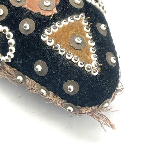 23 - An early 20th century soldier's sweetheart heart-shaped pin cushion, the black velvet covered obvers... 