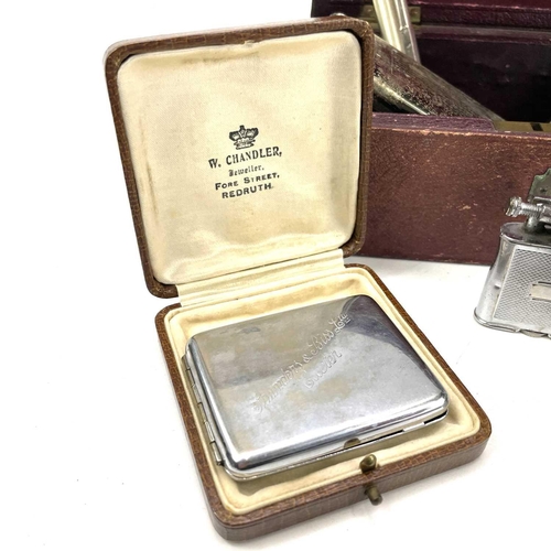 231 - A cigarette case with attached lighter monogrammed N L R together with a Swank arrow tie clip, Gille... 