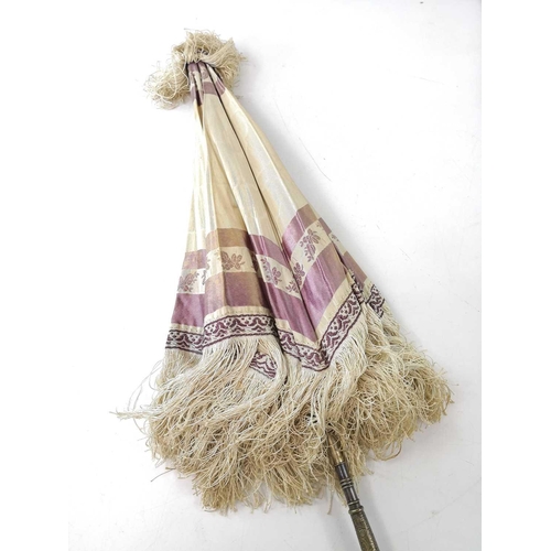 232 - A silk and bone handled parasol with metal mounts, length 61cm together with a pair of painted wood ... 