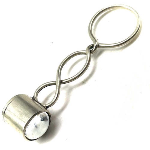 246 - A miniature eye or magnifying glass, circa 1880, with white metal handle, leather cased, length 6.5c... 