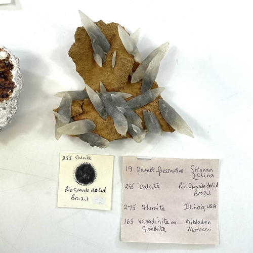 251 - A group of four good mineral specimens including garnet spessartine from Hunan China, Calcite from R... 