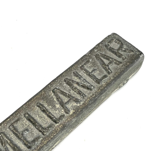 254 - A Williams, Harvey & Co Ltd Mellanear tin ingot bar, length 40cm.