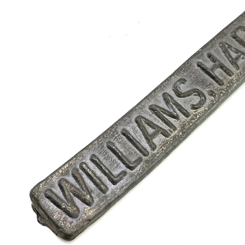 254 - A Williams, Harvey & Co Ltd Mellanear tin ingot bar, length 40cm.