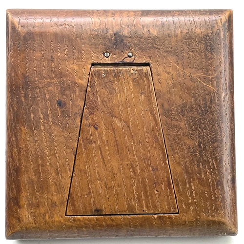 273 - An 8 day travel clock, in a faux tortoiseshell surround, in an oak case, 12.5cm square.