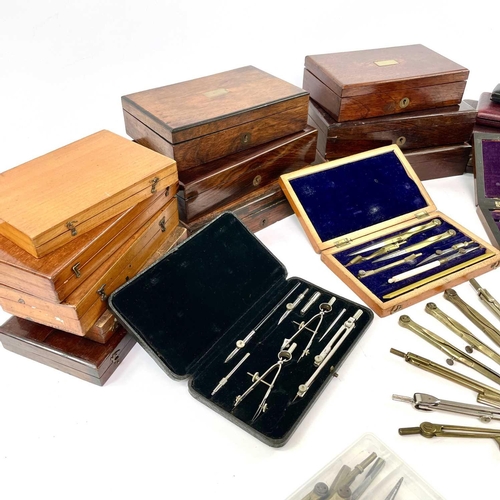 274 - A collection of assorted drawing instruments, Victorian and later, including cased sets and spares (... 