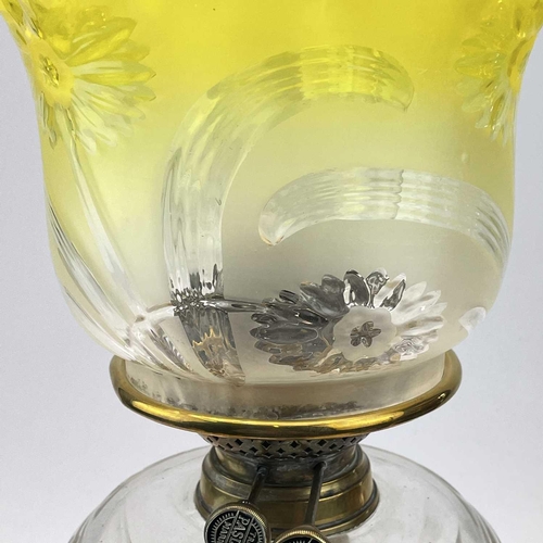 29 - A Victorian glass and brass oil lamp, with a graduated yellow glass shade and fitted a Pasley burner... 