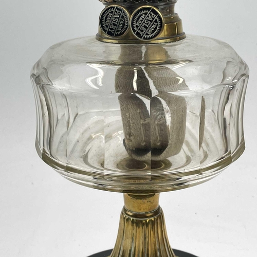 29 - A Victorian glass and brass oil lamp, with a graduated yellow glass shade and fitted a Pasley burner... 