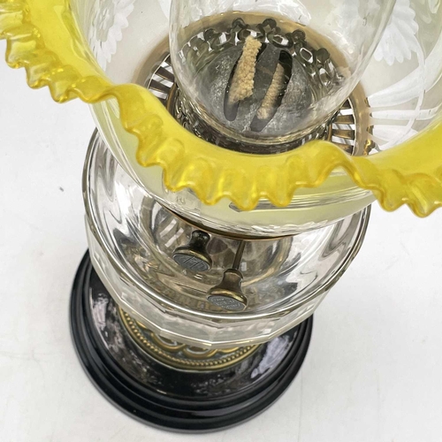 29 - A Victorian glass and brass oil lamp, with a graduated yellow glass shade and fitted a Pasley burner... 