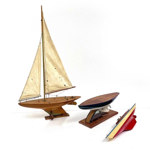 290 - A 20th century fully rigged pond yacht with stand, height 107cm, together with another two pond yach... 