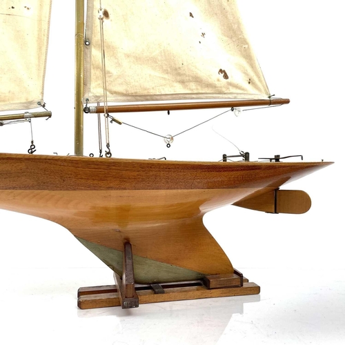 290 - A 20th century fully rigged pond yacht with stand, height 107cm, together with another two pond yach... 