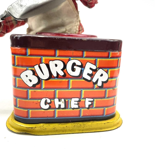 36 - A Japanese tinplate, fabric and plastic automaton toy titled 'Burger Chef', battery operated, height... 