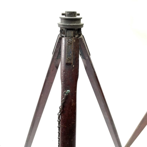 388 - An early 20th century theodolite tripod stand with brass lacquered mounts, height 98cm, together wit... 