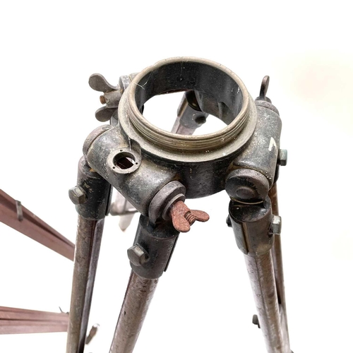 389 - A 20th century theodolite adjustable tripod stand with lacquered brass mounts, minimum height 84 max... 