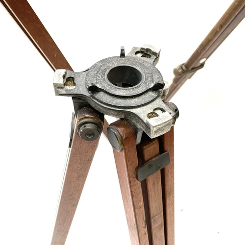 389 - A 20th century theodolite adjustable tripod stand with lacquered brass mounts, minimum height 84 max... 