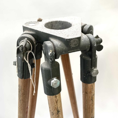 390 - A 20th century theodolite tripod stand with metal mounts and impressed broad arrow mark, height 164c... 