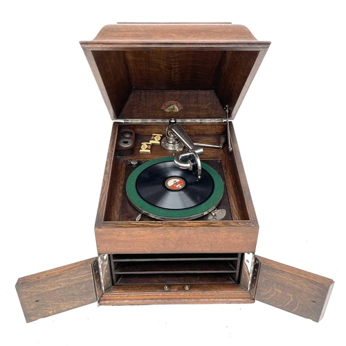 50 - An HMV oak table top wind-up gramophone, height 36cm, width 3cm, depth 47cm.