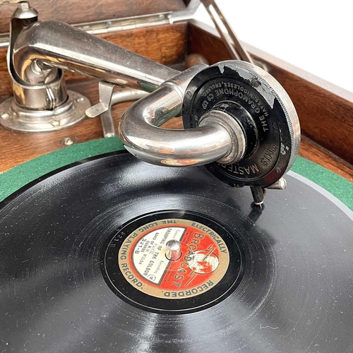 50 - An HMV oak table top wind-up gramophone, height 36cm, width 3cm, depth 47cm.