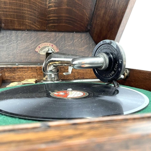 50 - An HMV oak table top wind-up gramophone, height 36cm, width 3cm, depth 47cm.