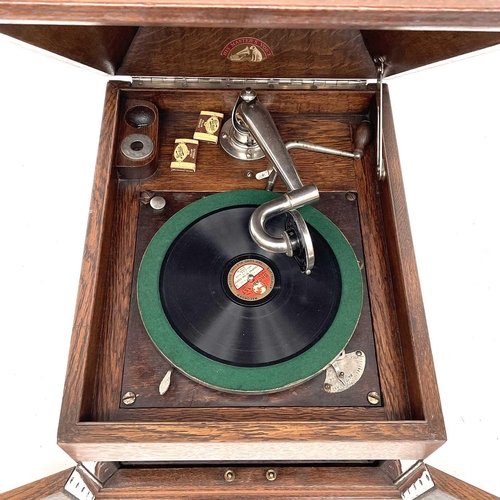 50 - An HMV oak table top wind-up gramophone, height 36cm, width 3cm, depth 47cm.