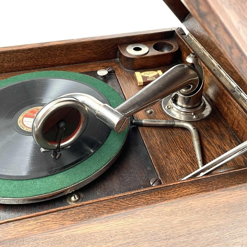 50 - An HMV oak table top wind-up gramophone, height 36cm, width 3cm, depth 47cm.