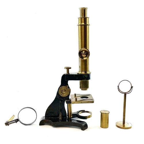 57 - A brass and painted metal microscope, circa 1900, with additional lens and viewer, height 39cm, in a... 