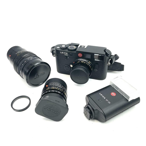 58 - A Leica M6 TTL black serial number 2497046 1999 with a Leica ELMAR-M 1:2. 8/50 E39 3727117 lens, Lei... 